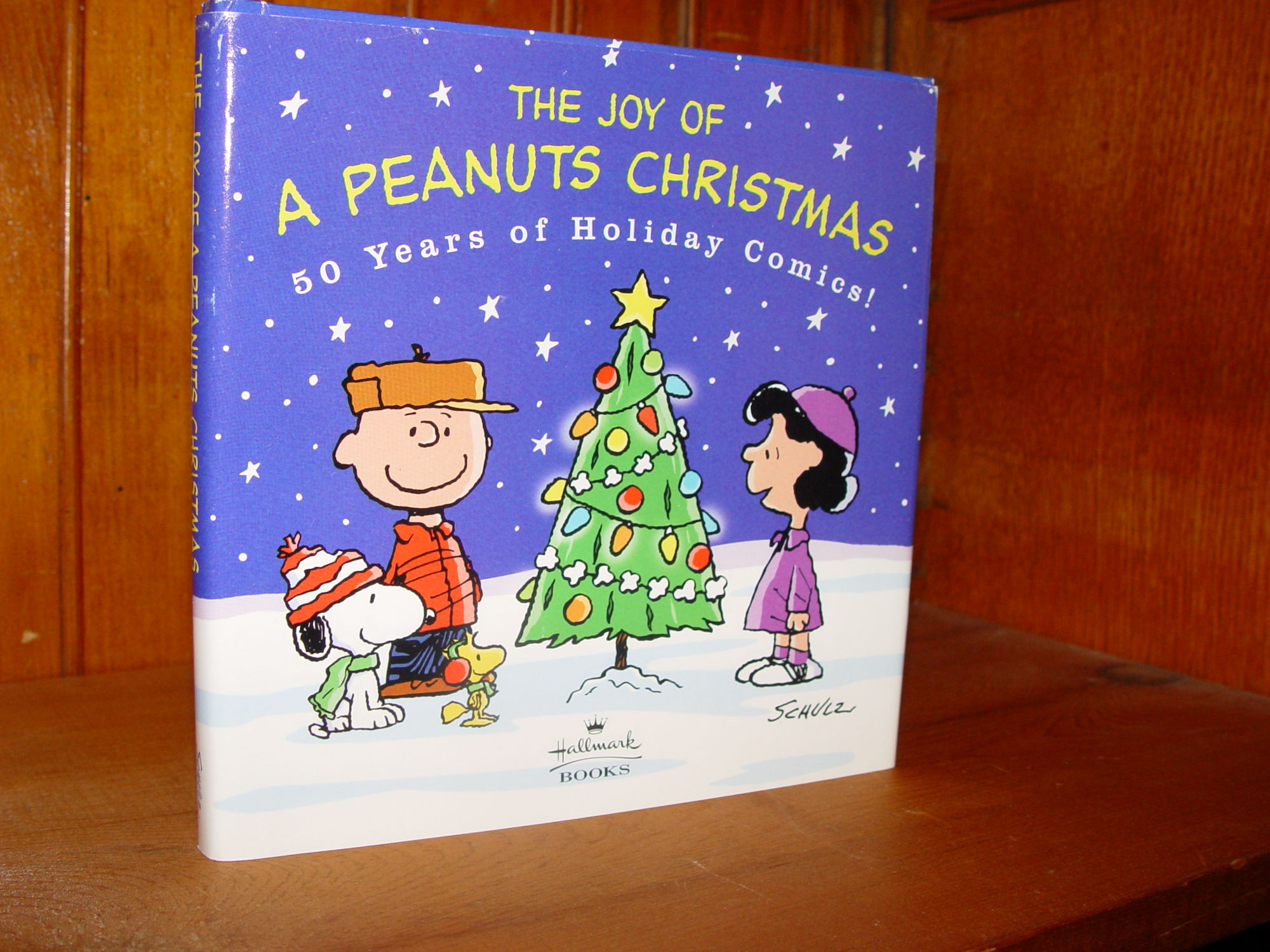 The Joy of a Peanuts Christmas - 50 Years
                        of Holiday Comics! Hallmark Book