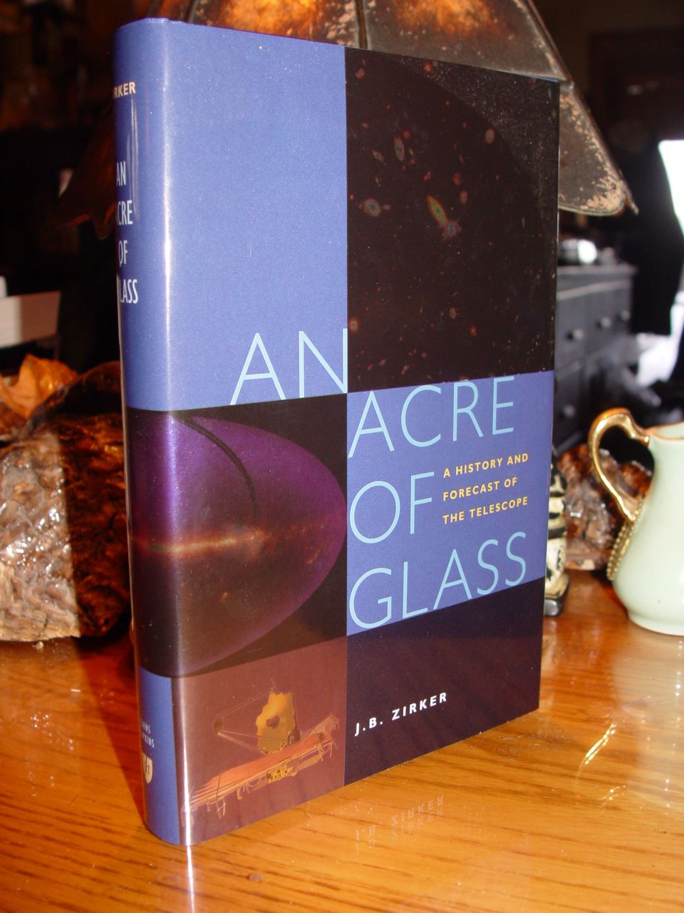 An Acre of Glass: A History and Forecast of
                        the Telescope 2005 by J. B. Zirker