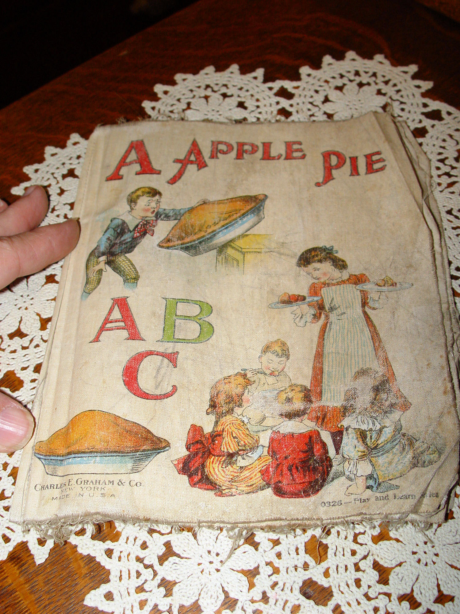 A Apple Pie, ABC Charles E. Graham; Cloth
                        Book for Children